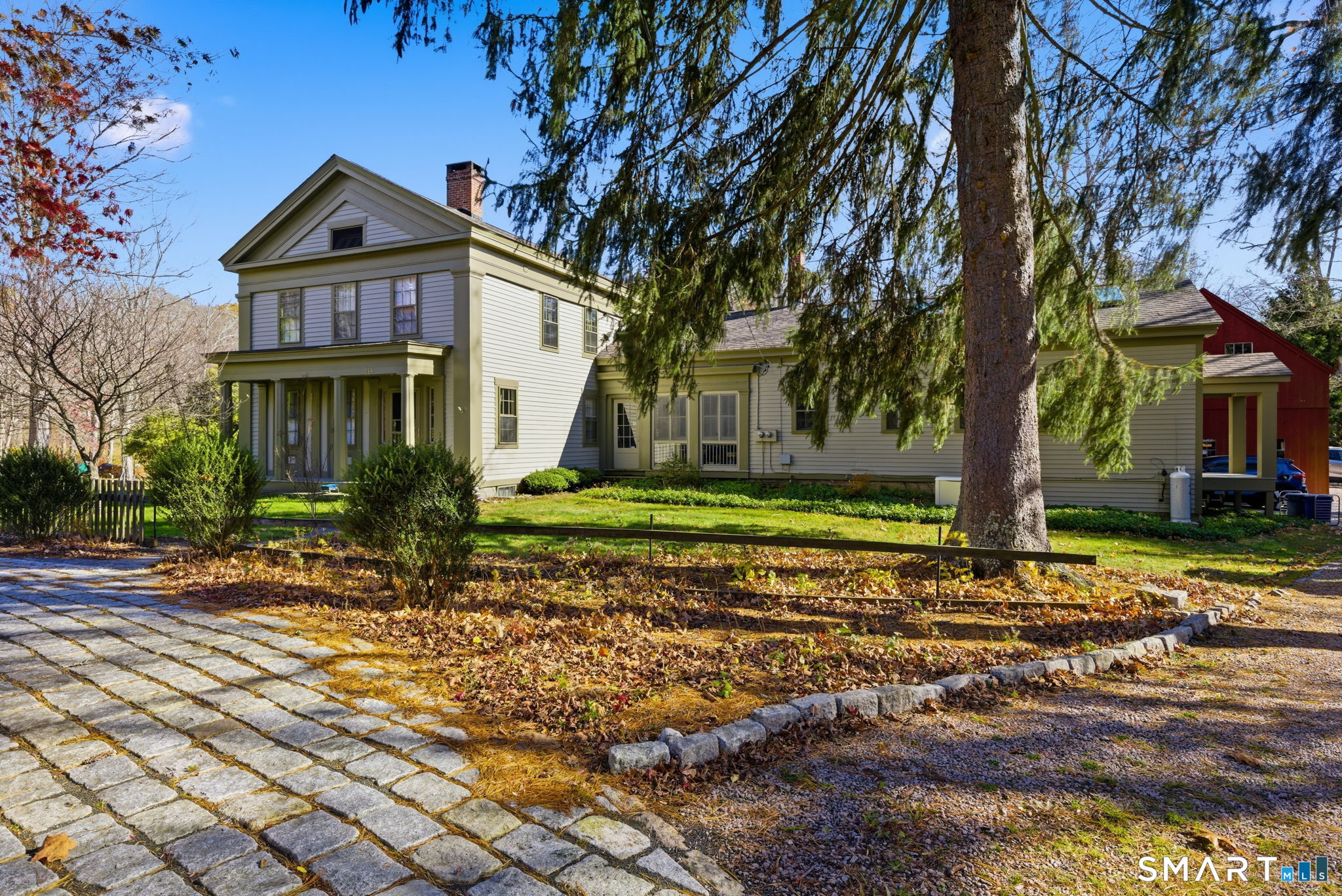 214 Green Hill Road Killingworth, CT 06419 - Photo 1 of 1 a front view of a house with a yard