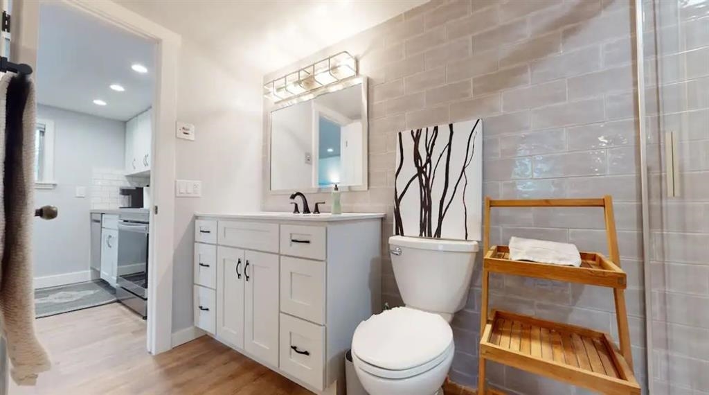 137 Laurel Mountain Road, Unit 418 Mammoth Lakes, CA 93546 - Photo 16 of 23 Full bathroom featuring vanity, light wood-style floors, and recessed lighting