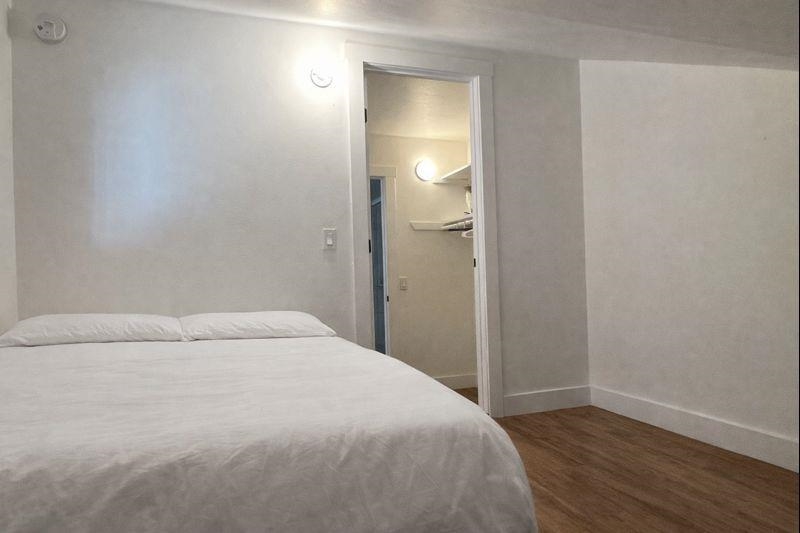 137 Laurel Mountain Road, Unit 418 Mammoth Lakes, CA 93546 - Photo 17 of 23 Bedroom with dark wood-style flooring and baseboards