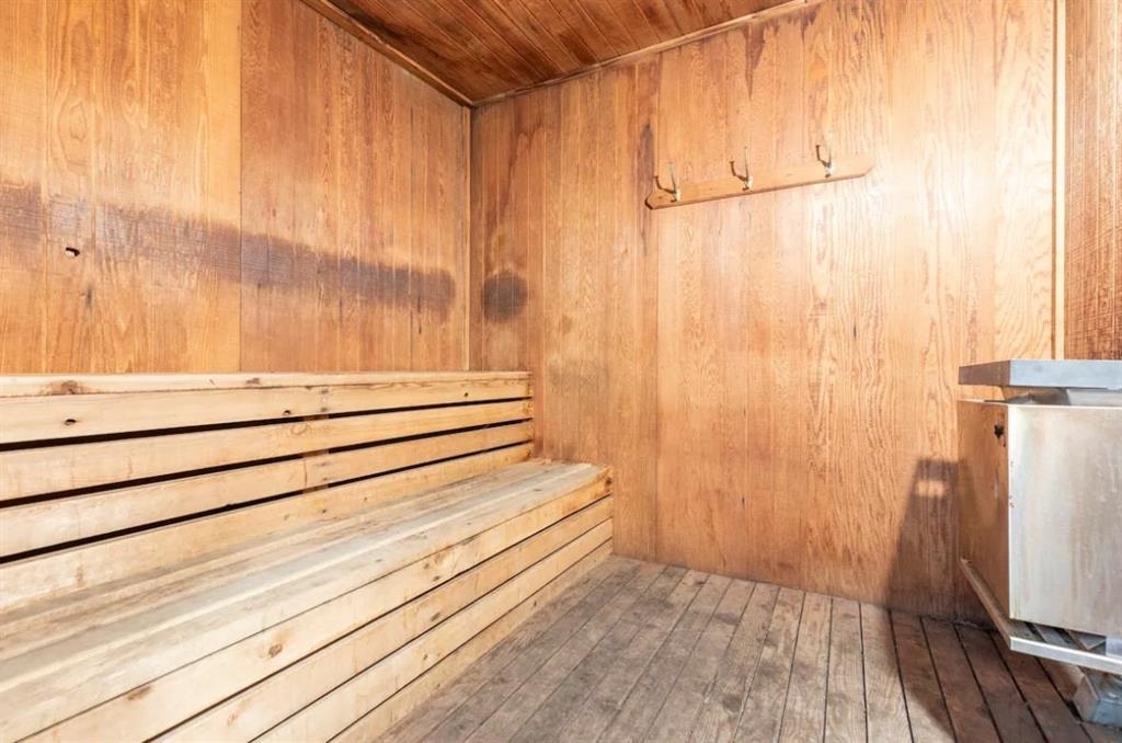 137 Laurel Mountain Road, Unit 418 Mammoth Lakes, CA 93546 - Photo 20 of 23 Relaxing sauna featuring wood ceiling, hardwood / wood-style floors, and wood walls