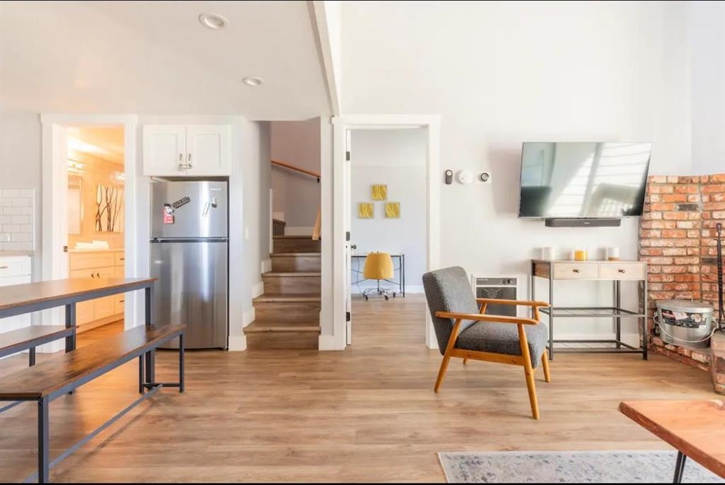 137 Laurel Mountain Road, Unit 418 Mammoth Lakes, CA 93546 - Photo 3 of 23 Living area featuring light wood finished floors