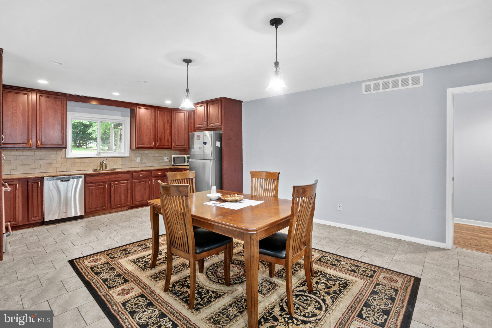 609 Foster Road Cheltenham, PA 19012 - Photo 6 of 44 Inviting kitchen with modern charm.