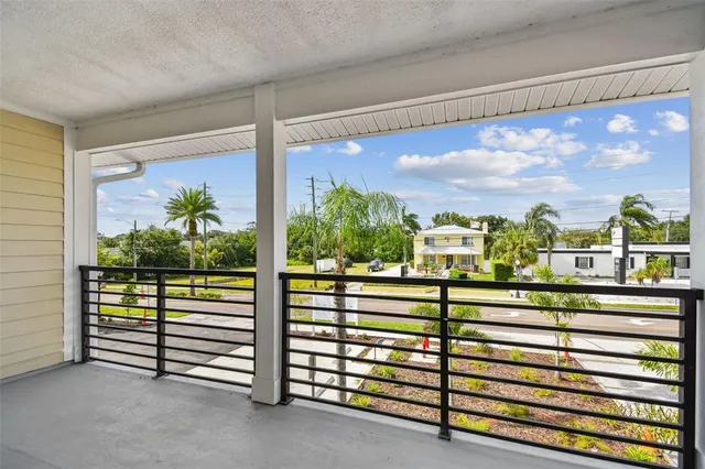 a view of a porch with furniture