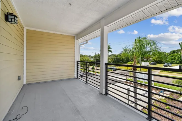 a view of a balcony with an outdoor space