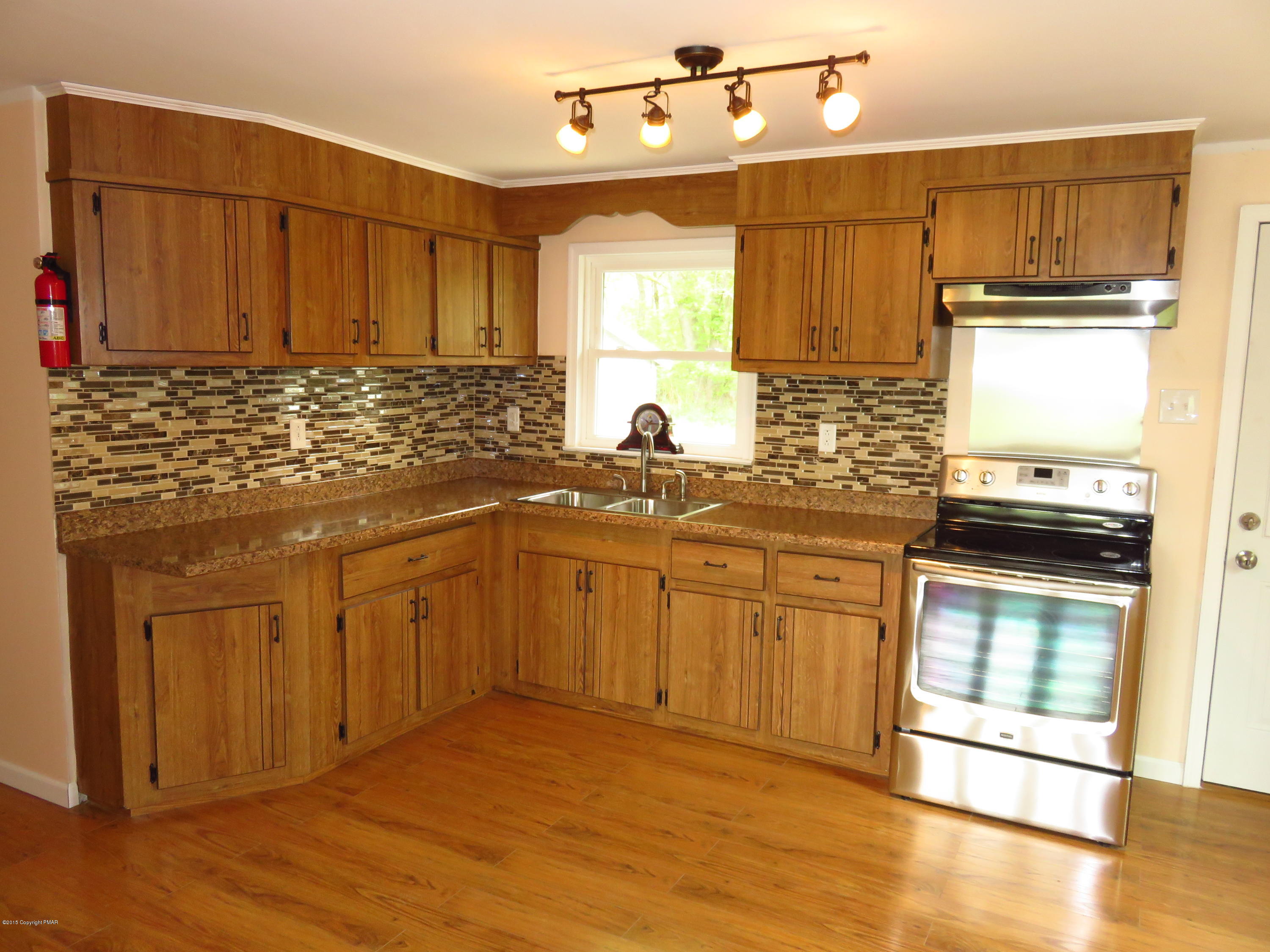 4066 Long Run Road Lehighton, PA 18235 - Photo 11 of 18 a kitchen with stainless steel appliances granite countertop a sink stove and cabinets