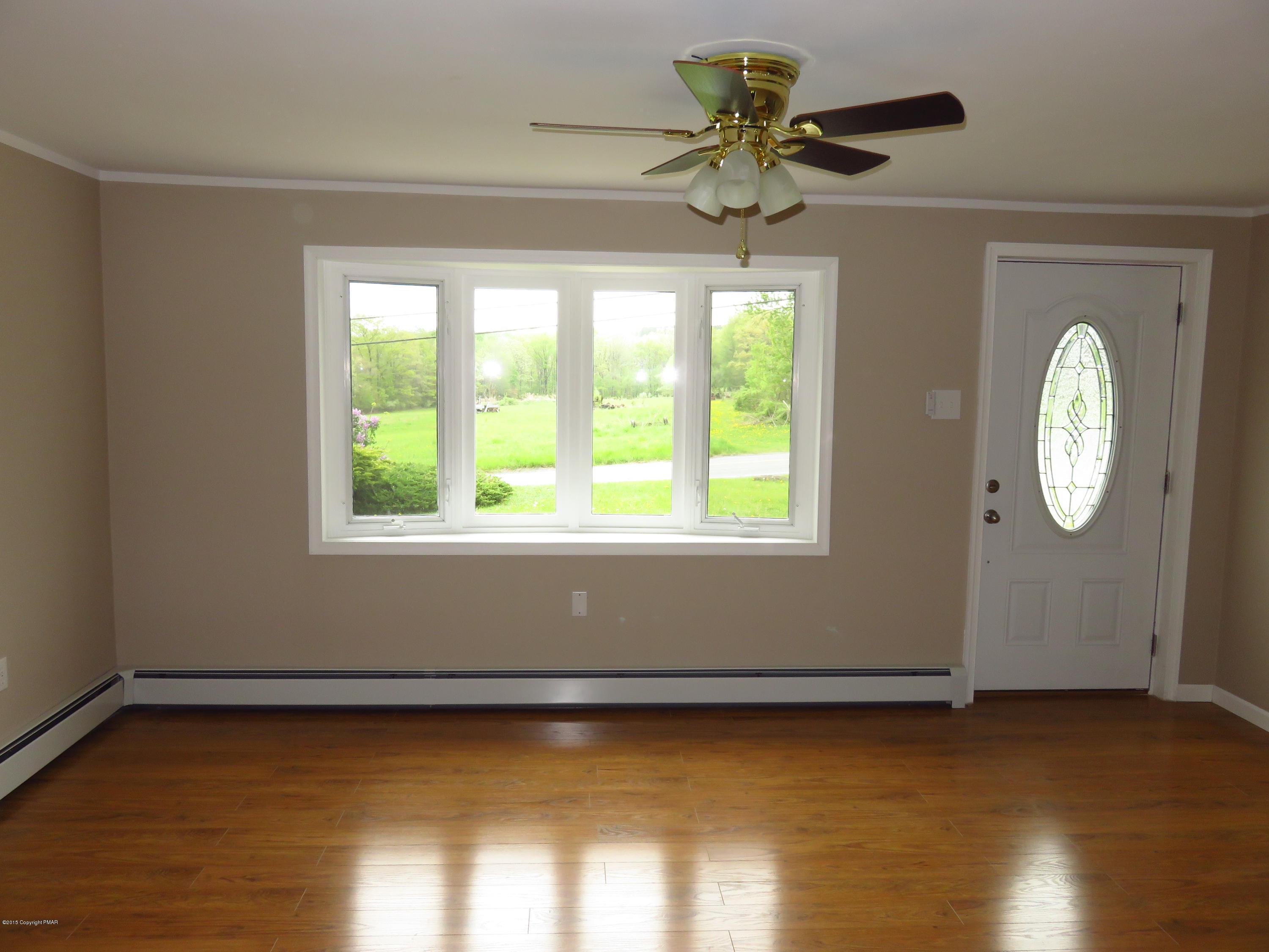 4066 Long Run Road Lehighton, PA 18235 - Photo 4 of 18 a view of a room with wooden floor and a window