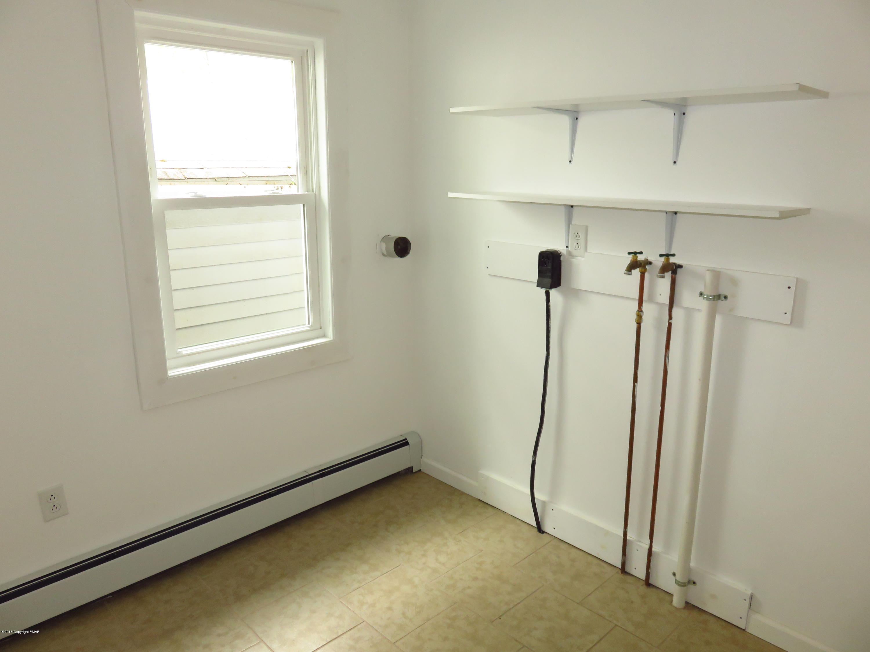4066 Long Run Road Lehighton, PA 18235 - Photo 9 of 18 a view of a room with wooden floor and windows