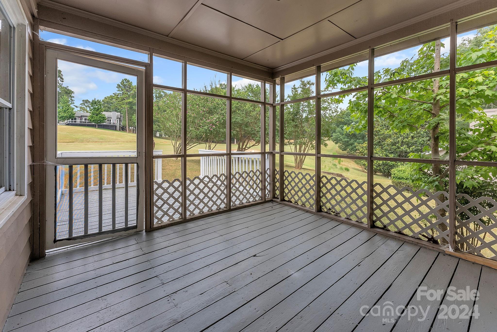 1018 Palmyra Drive Tega Cay, SC 29708 - Photo 35 of 36 a view of front door with wooden floor