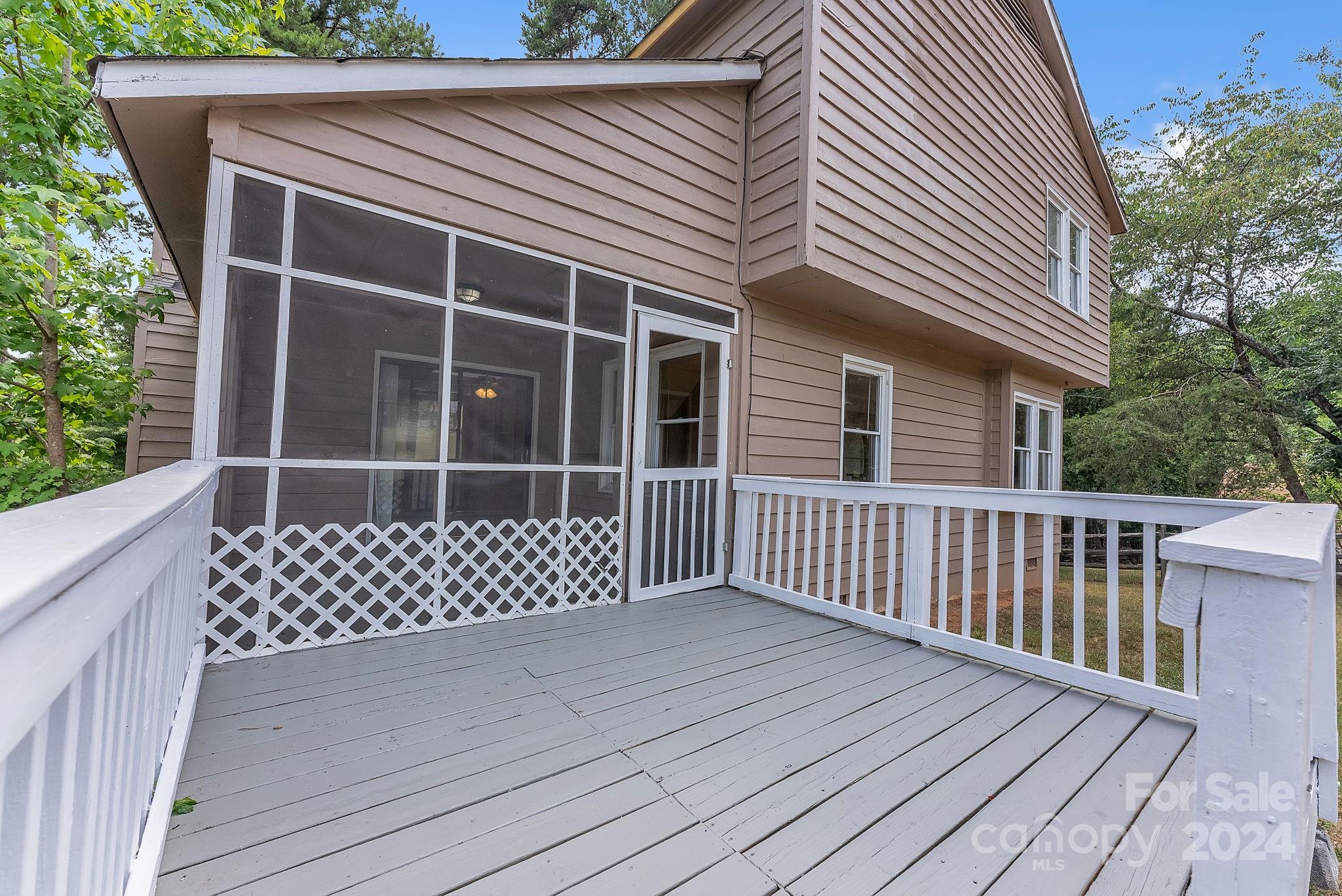 1018 Palmyra Drive Tega Cay, SC 29708 - Photo 36 of 36 a view of a wooden house