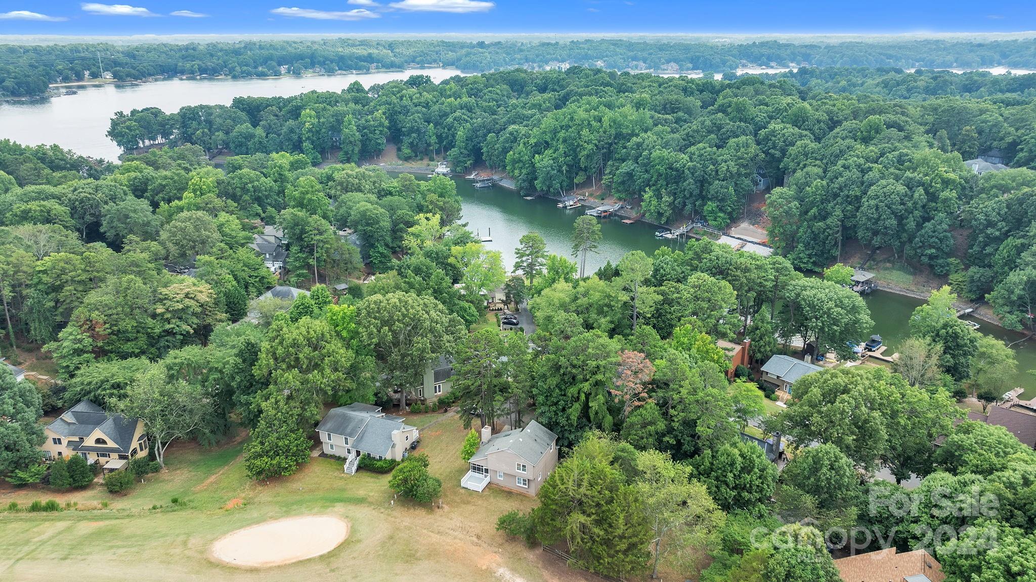 1018 Palmyra Drive Tega Cay, SC 29708 - Photo 7 of 36 a view of a lake with green space