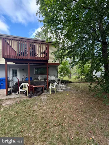 a view of a car park in front of house