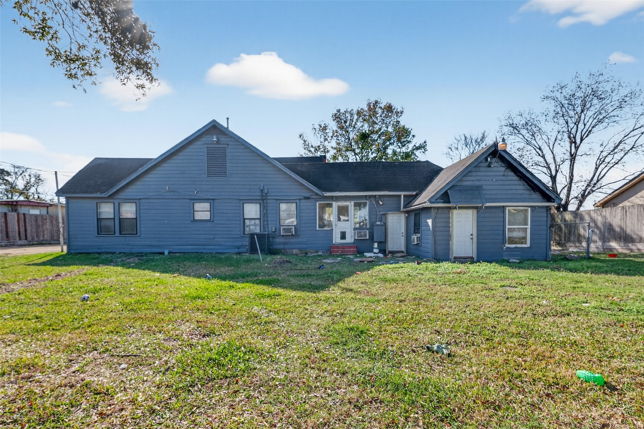 15627 Market Street Channelview, TX 77530 - Photo 17 of 35 a front view of a house with yard and green space