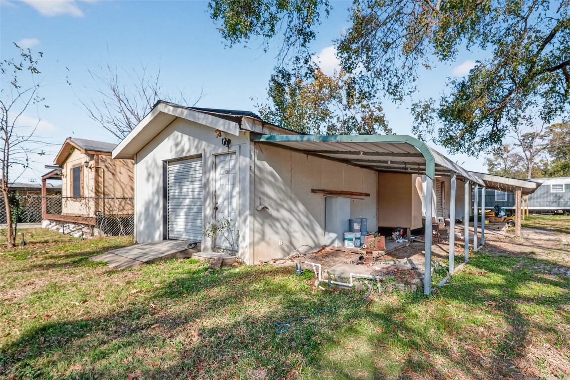 15627 Market Street Channelview, TX 77530 - Photo 19 of 35 a front view of a house with garden