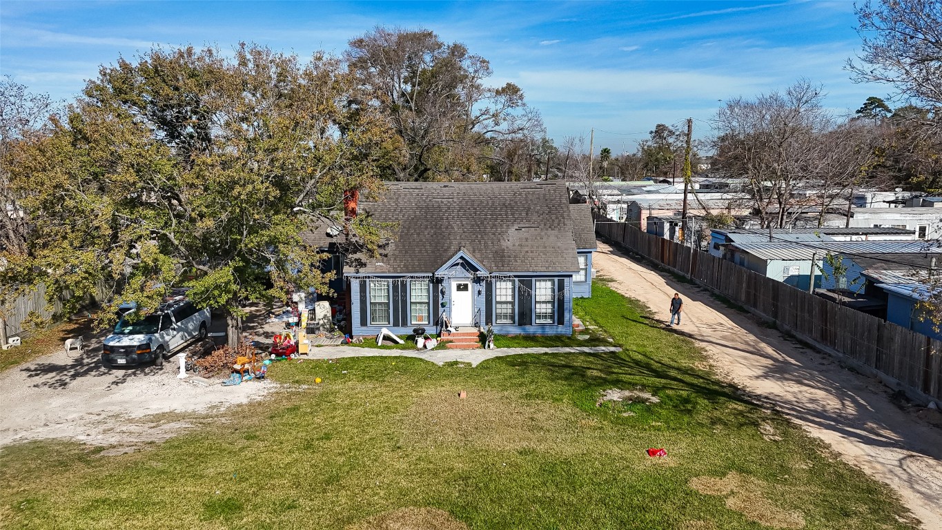 15627 Market Street Channelview, TX 77530 - Photo 2 of 35 a view of a house with a yard from a balcony