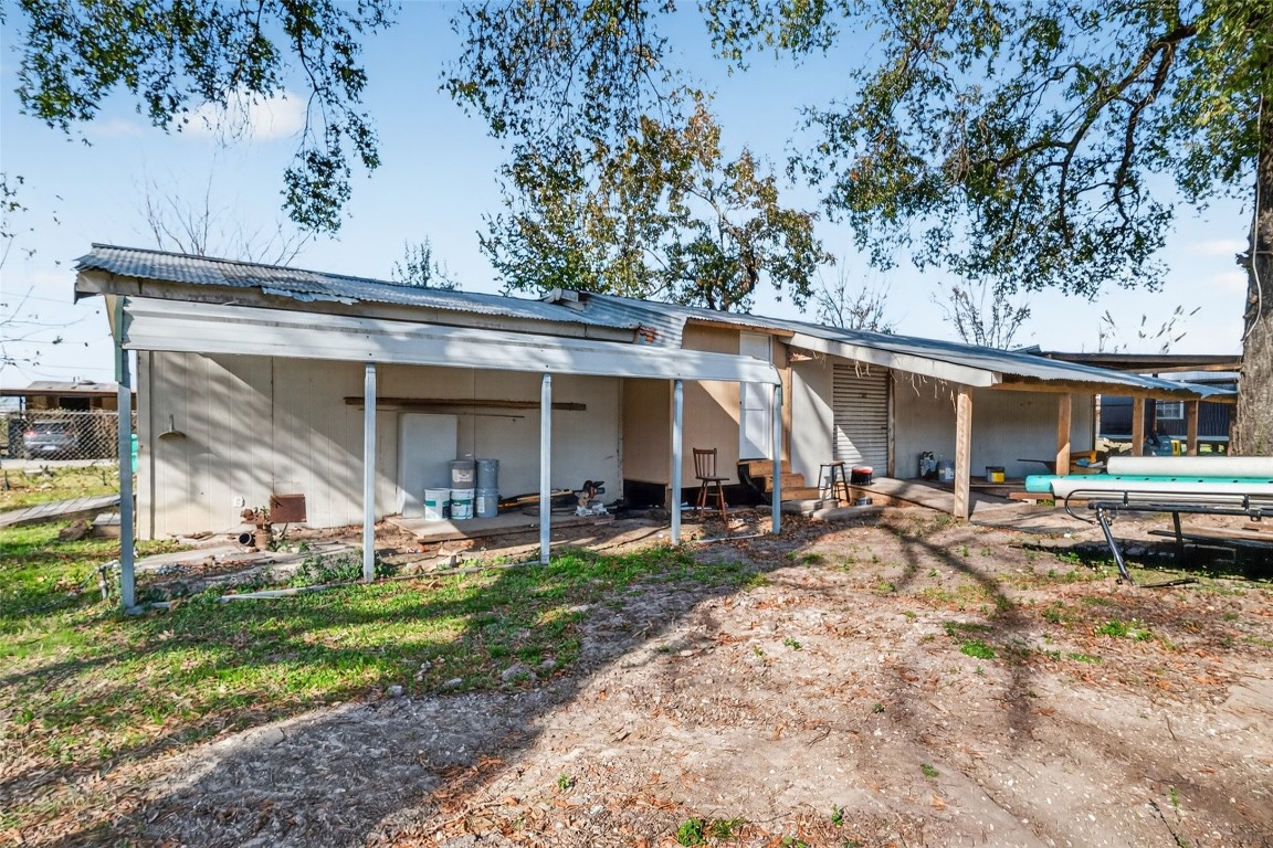 15627 Market Street Channelview, TX 77530 - Photo 21 of 35 a view of a house with backyard porch and sitting area