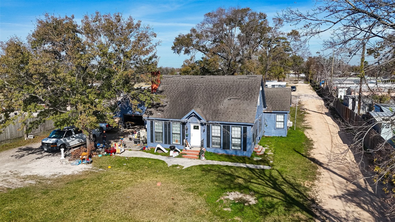 15627 Market Street Channelview, TX 77530 - Photo 29 of 35 front view of a house with a yard
