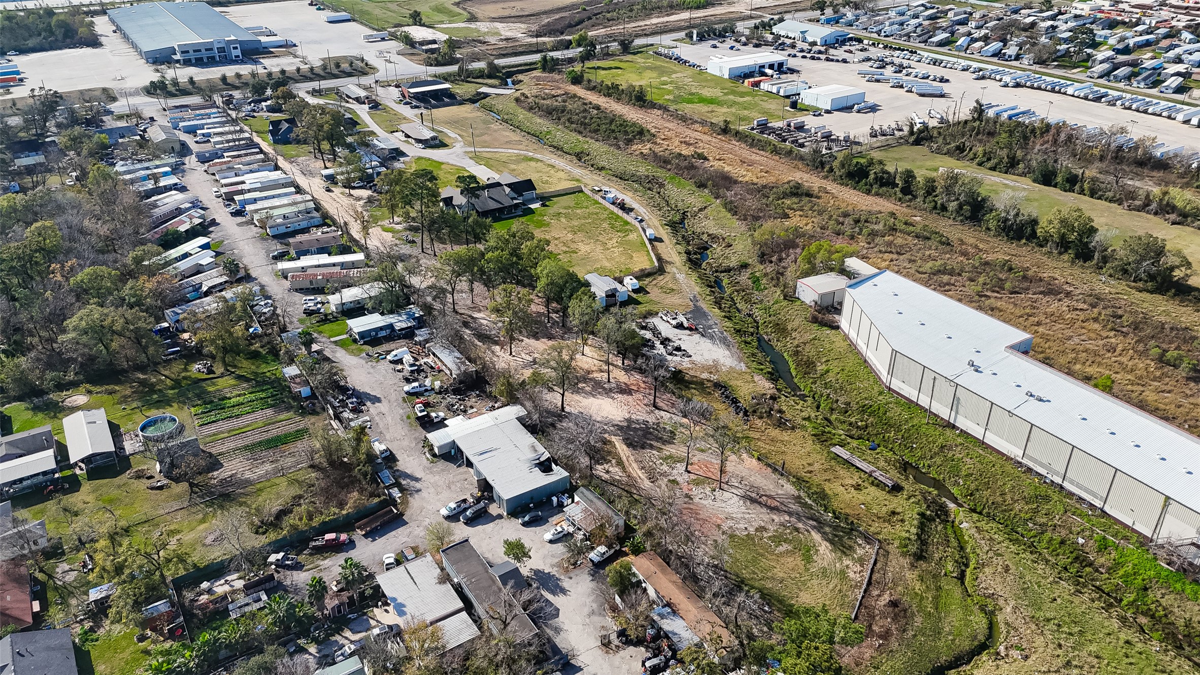 15627 Market Street Channelview, TX 77530 - Photo 33 of 35 an aerial view of residential houses with outdoor space