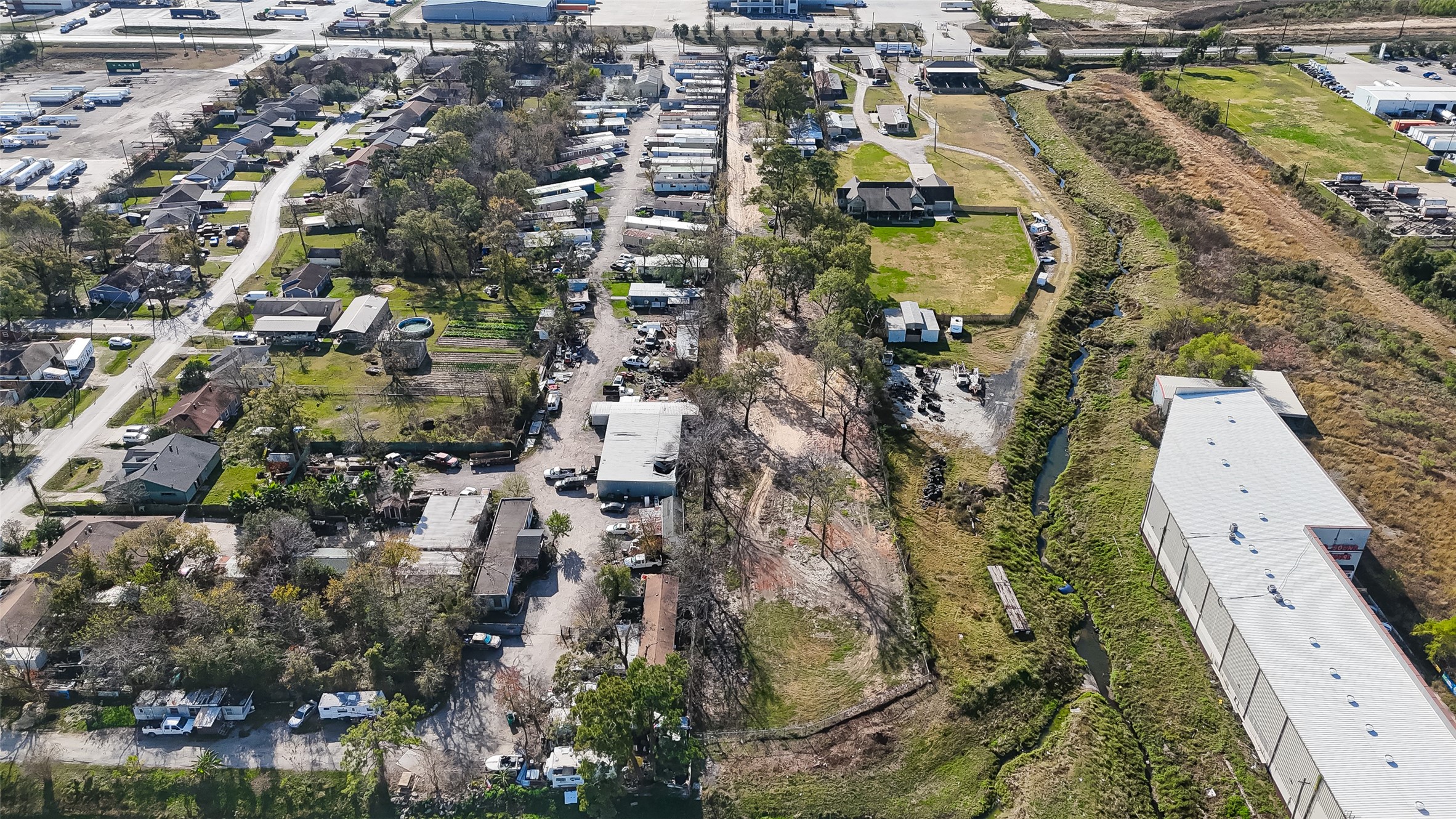15627 Market Street Channelview, TX 77530 - Photo 34 of 35 an aerial view of residential houses with outdoor space