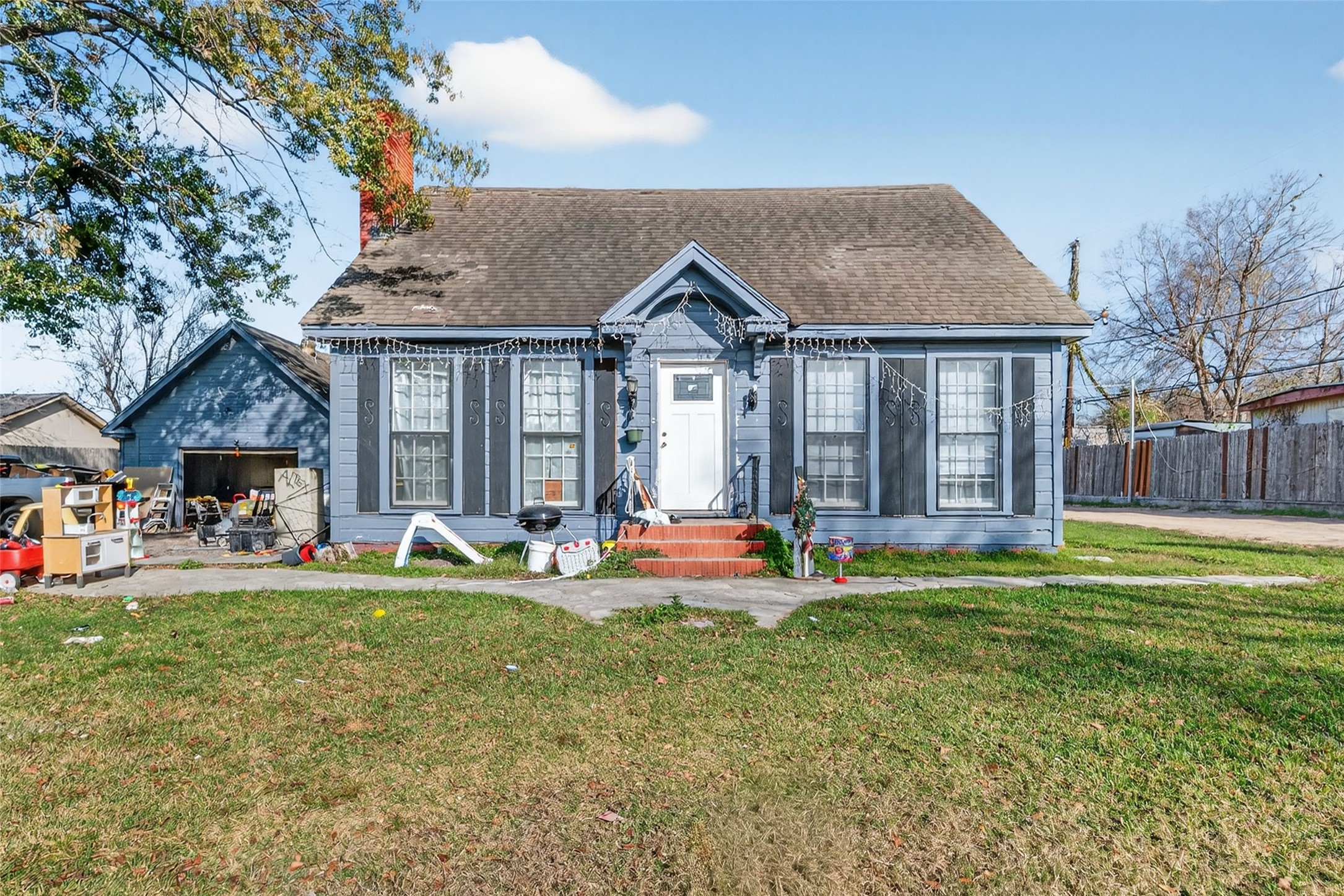 15627 Market Street Channelview, TX 77530 - Photo 5 of 35 a front view of house with yard and outdoor seating