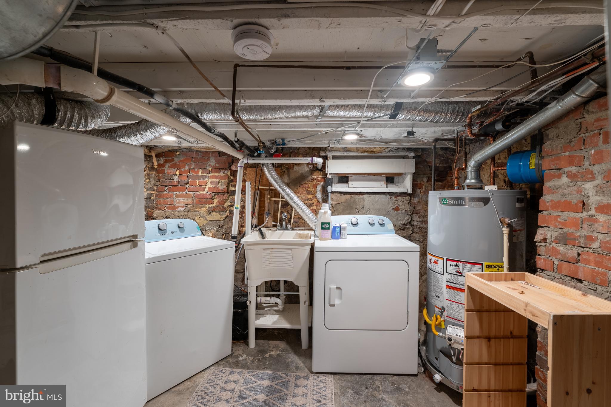 1627 Olive Street Baltimore, MD 21230 - Photo 20 of 22 a utility room with dryer and washer
