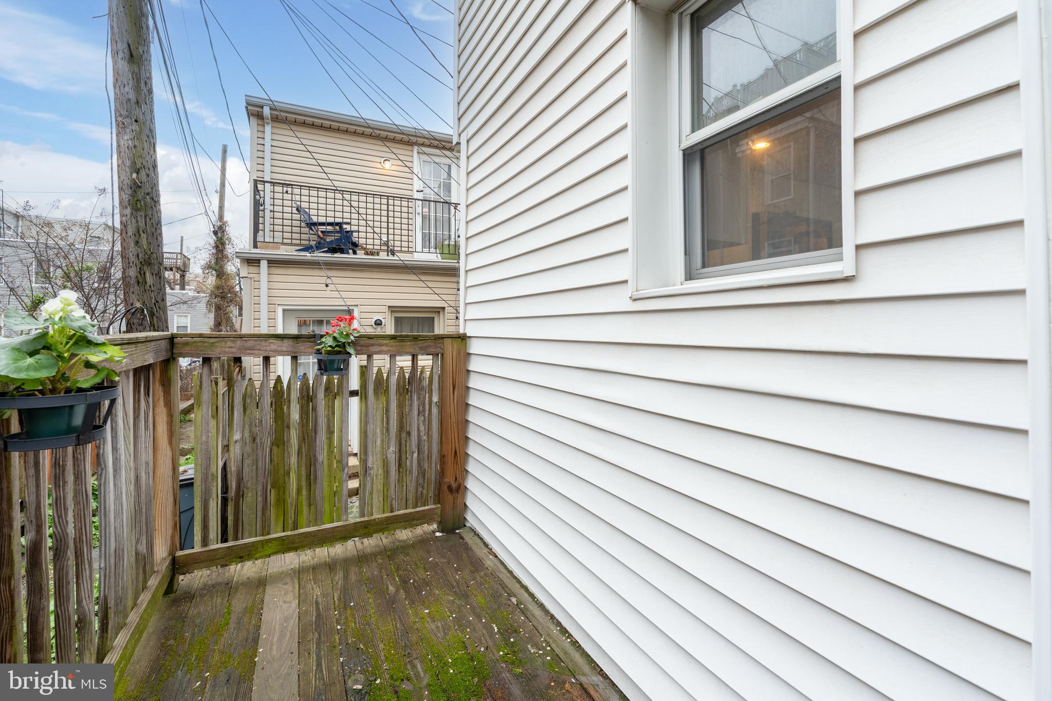 1627 Olive Street Baltimore, MD 21230 - Photo 21 of 22 a view of a balcony with furniture