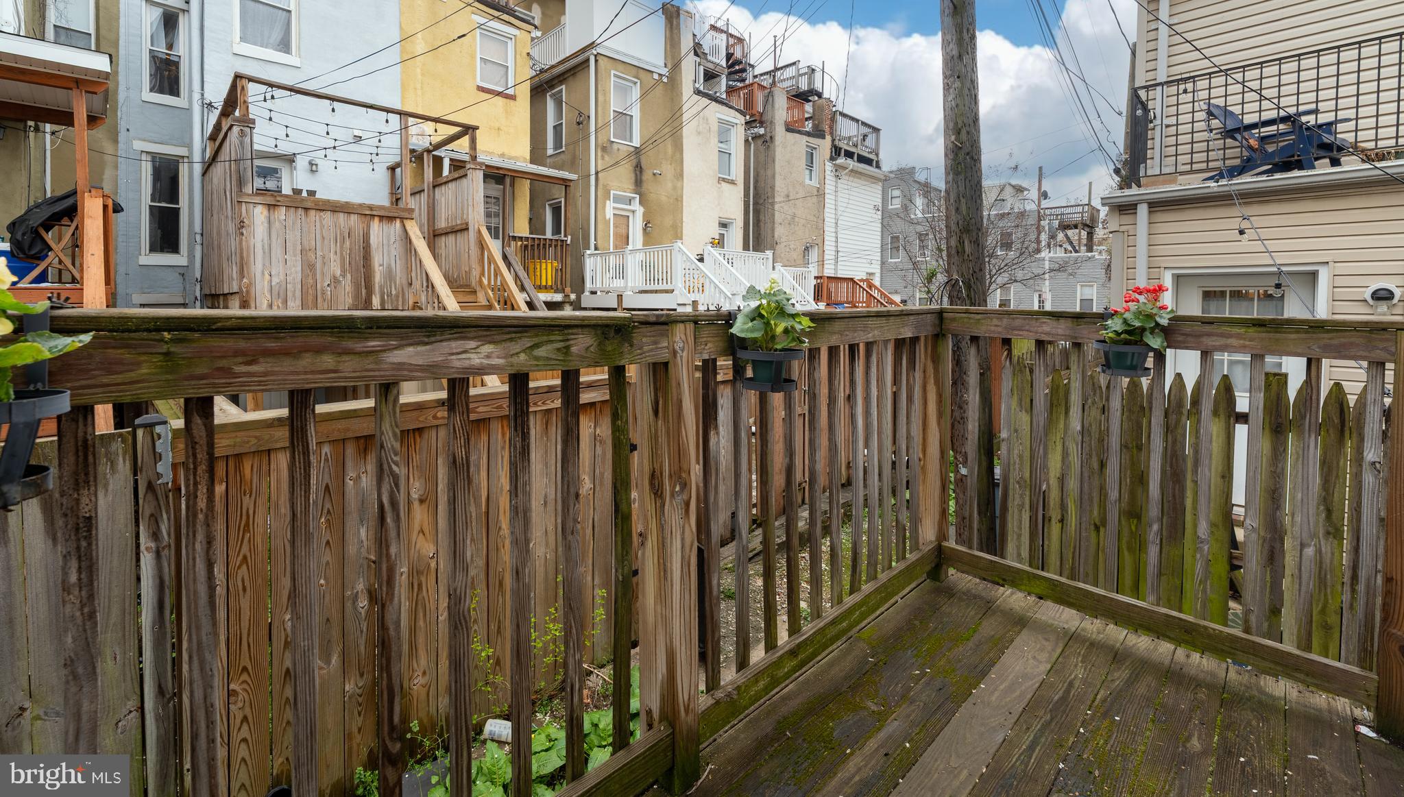 1627 Olive Street Baltimore, MD 21230 - Photo 22 of 22 a view of a street with wooden fence