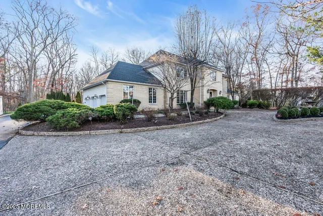 a view of house with a street