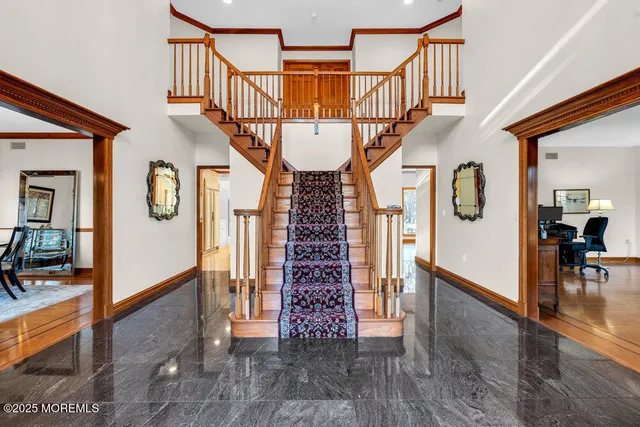 a view of entryway with a front door