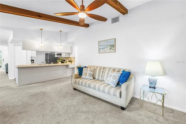 a view of kitchen with furniture and window