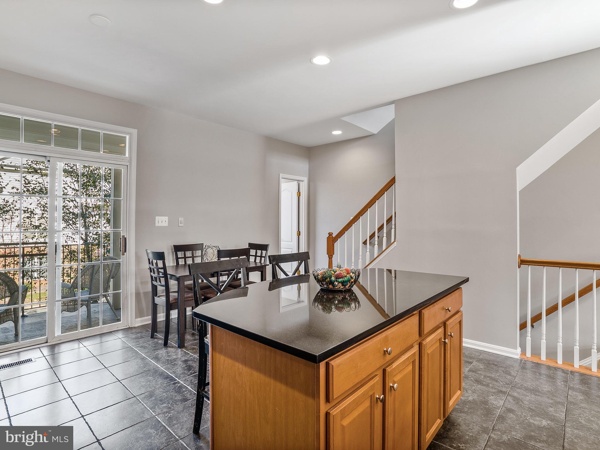 24712 Clock Tower Square Aldie, VA 20105 - Photo 12 of 30 Tile Floors & Black Granite Counter tops