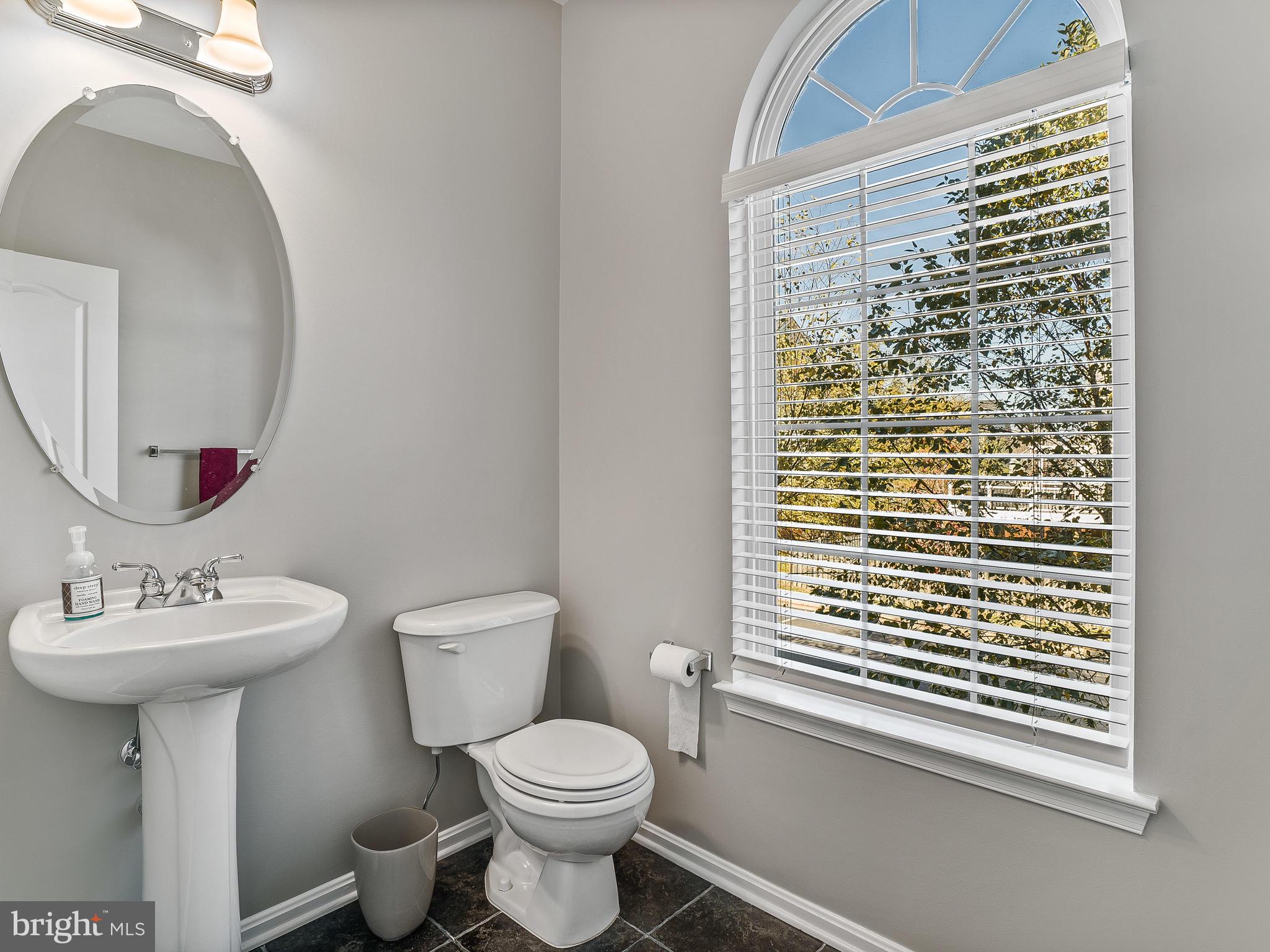 24712 Clock Tower Square Aldie, VA 20105 - Photo 14 of 30 Powder Room off Kitchen