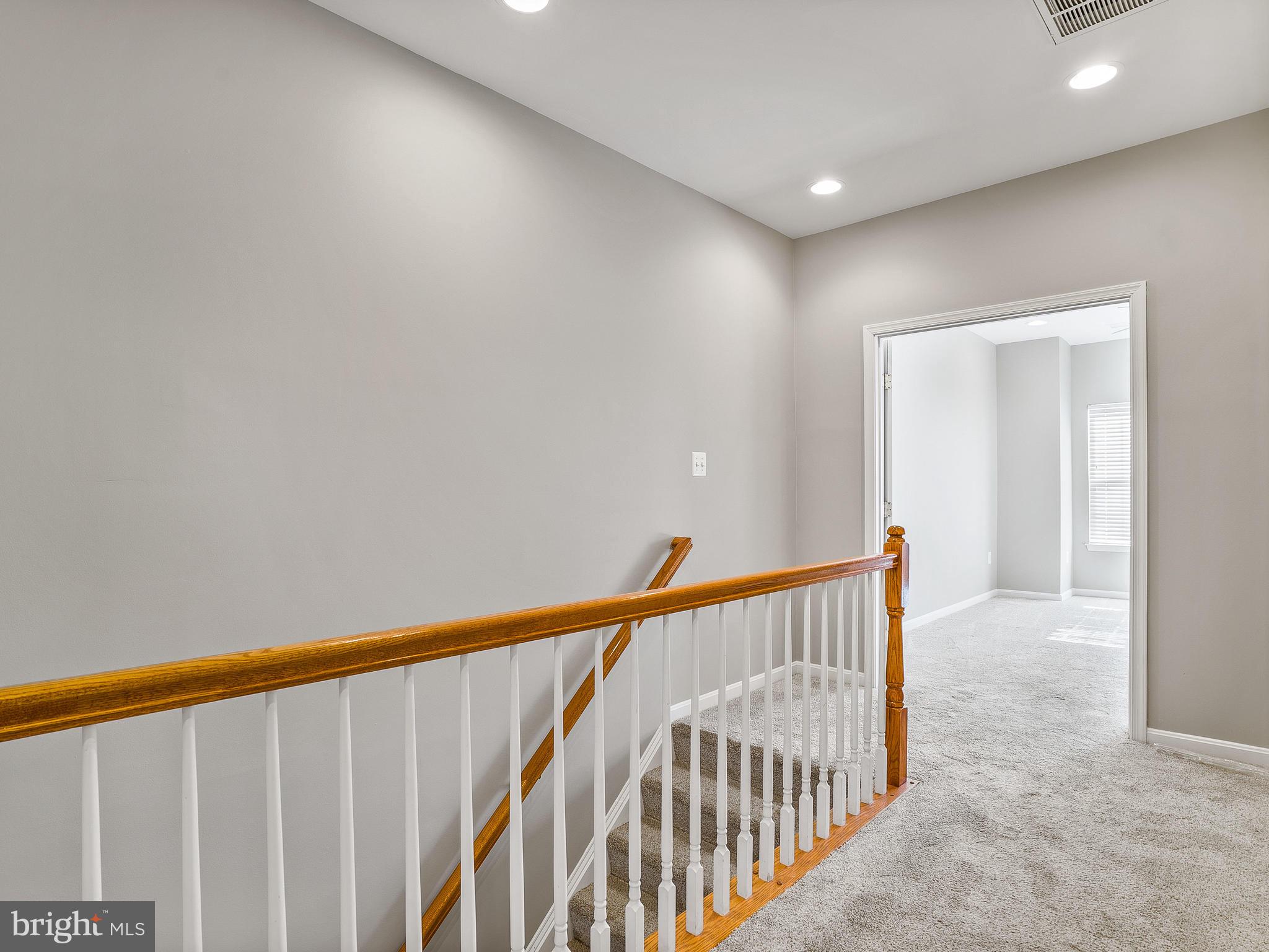 24712 Clock Tower Square Aldie, VA 20105 - Photo 15 of 30 3rd Floor landing: French doors to Master Bedroom