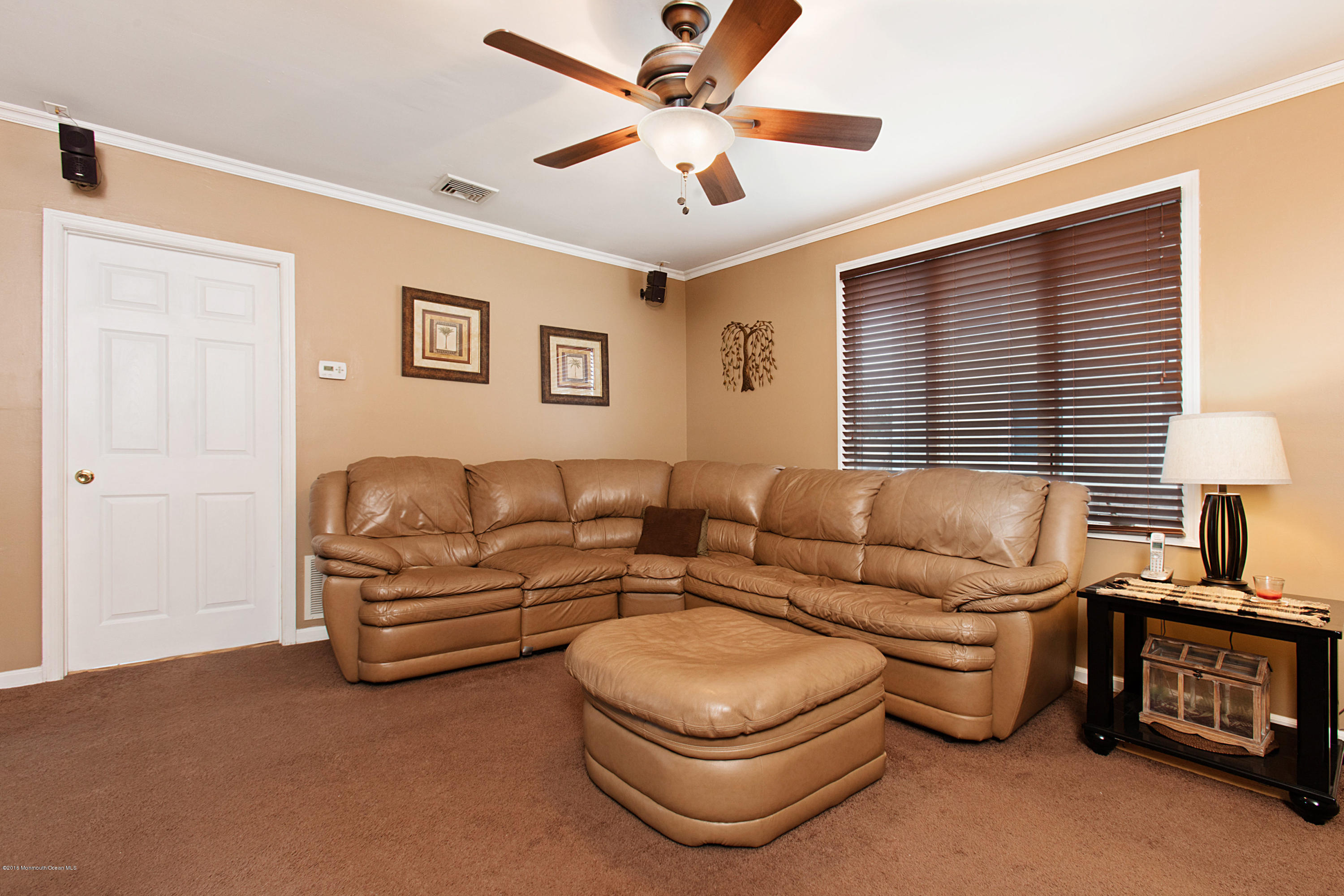 312 Florence Road Middletown, NJ 07748 - Photo 7 of 18 a living room with furniture and a window