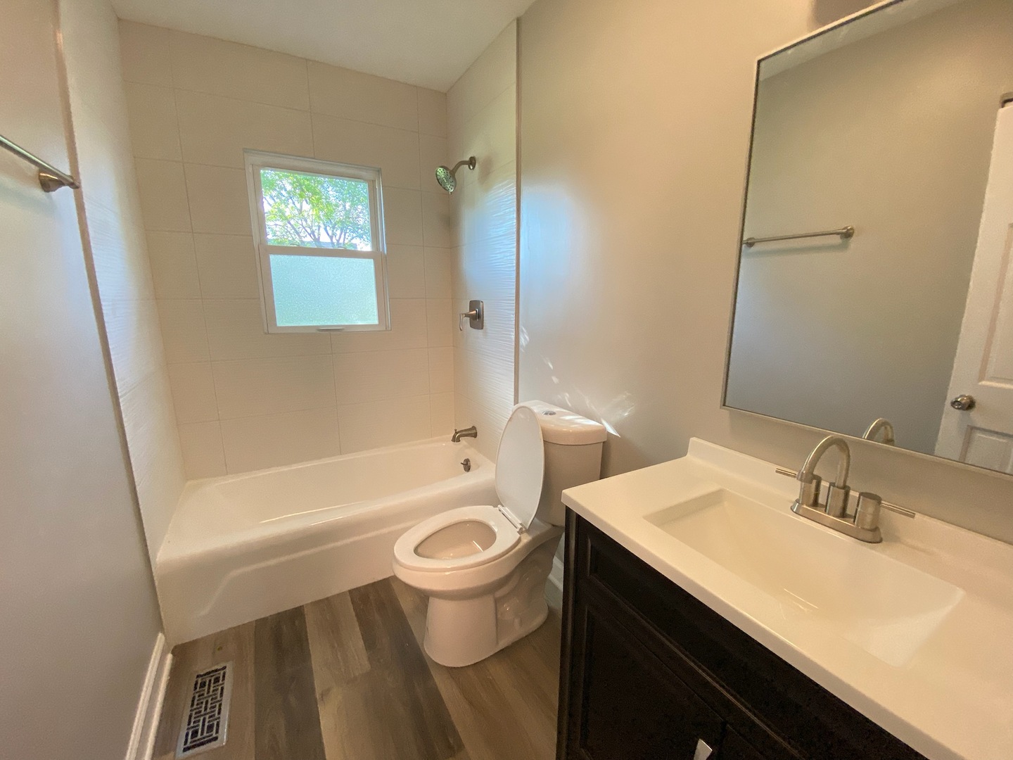 1981 Opal Drive Aurora, IL 60506 - Photo 13 of 18 a bathroom with a sink a toilet and a bathtub