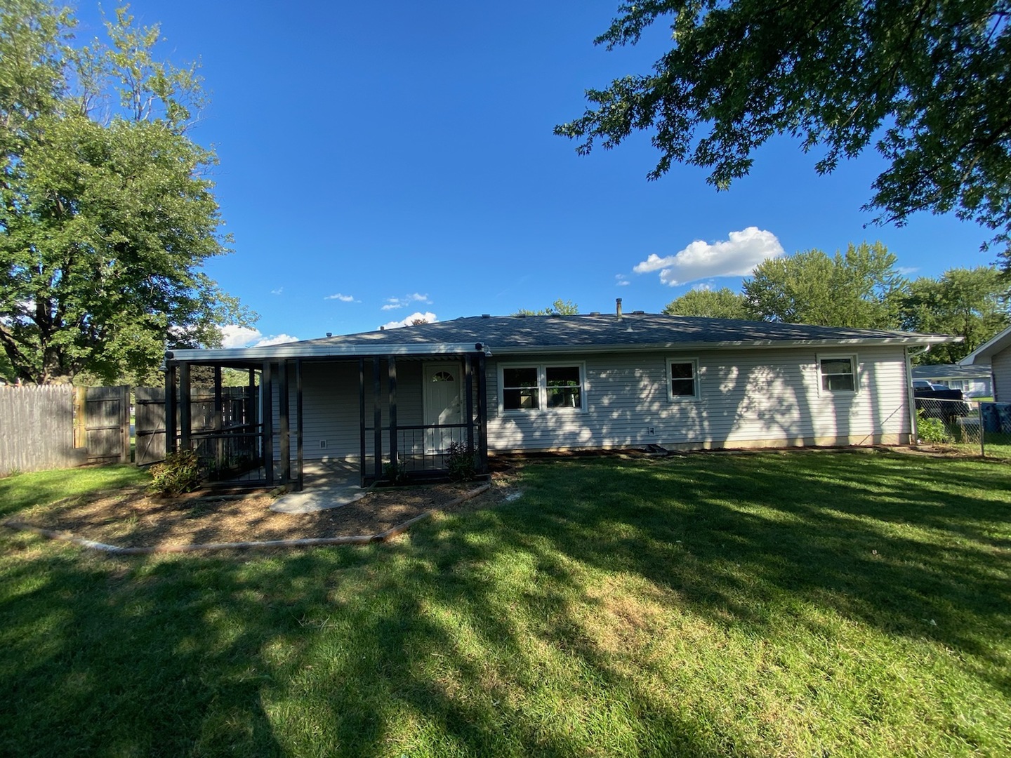 1981 Opal Drive Aurora, IL 60506 - Photo 17 of 18 a front view of a house with a garden