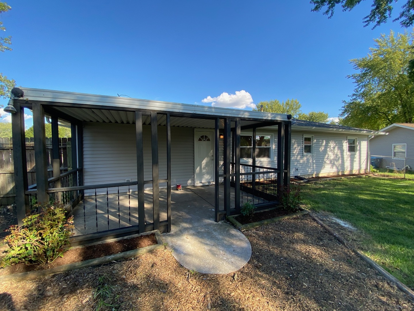 1981 Opal Drive Aurora, IL 60506 - Photo 18 of 18 a front view of a house with garden