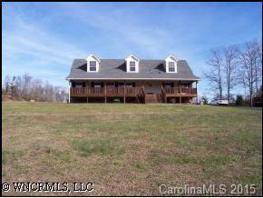 131 Timber Ridge Rutherfordton, NC 28139 - Photo 2 of 5 a view of a house with a yard and sitting area