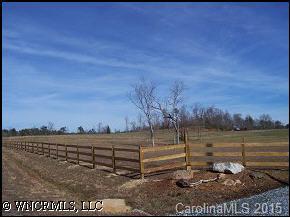 131 Timber Ridge Rutherfordton, NC 28139 - Photo 5 of 5 a view of a lake with a yard