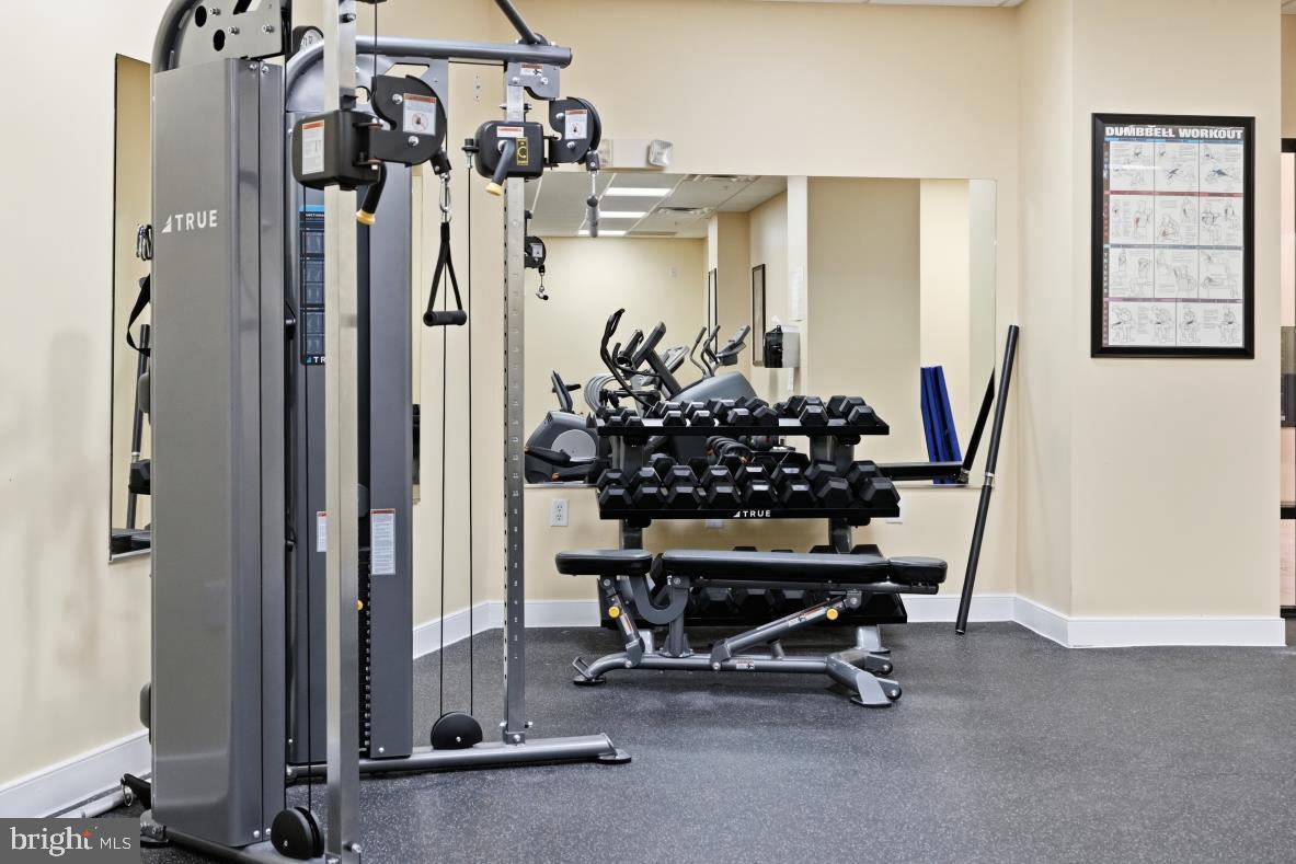 8045 Newell Street, Unit 423 Silver Spring, MD 20910 - Photo 23 of 26 a view of a room with gym equipment