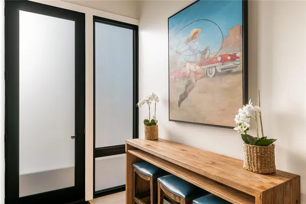 a kitchen with stainless steel appliances granite countertop a sink a stove and microwave