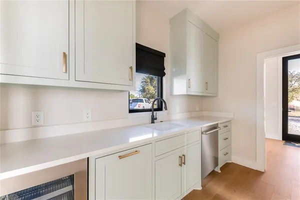 a view of a hallway with a balcony