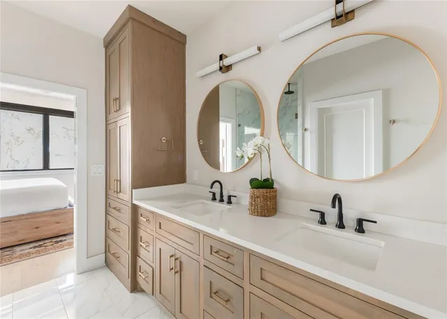 a bathroom with a sink and a mirror