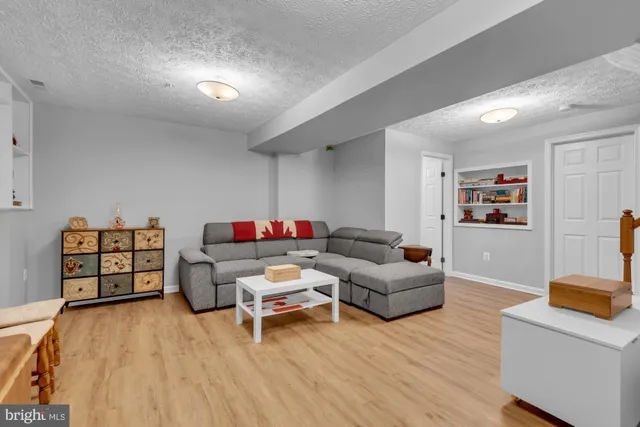 a balcony with wooden floor and fence