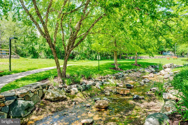 a view of a lake with a big yard