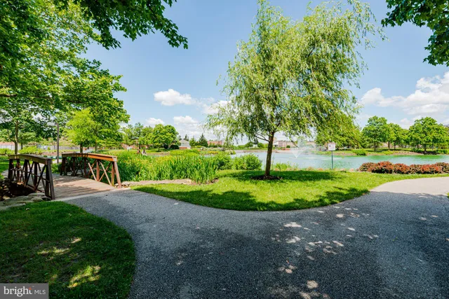 a view of a lake with a building in the background