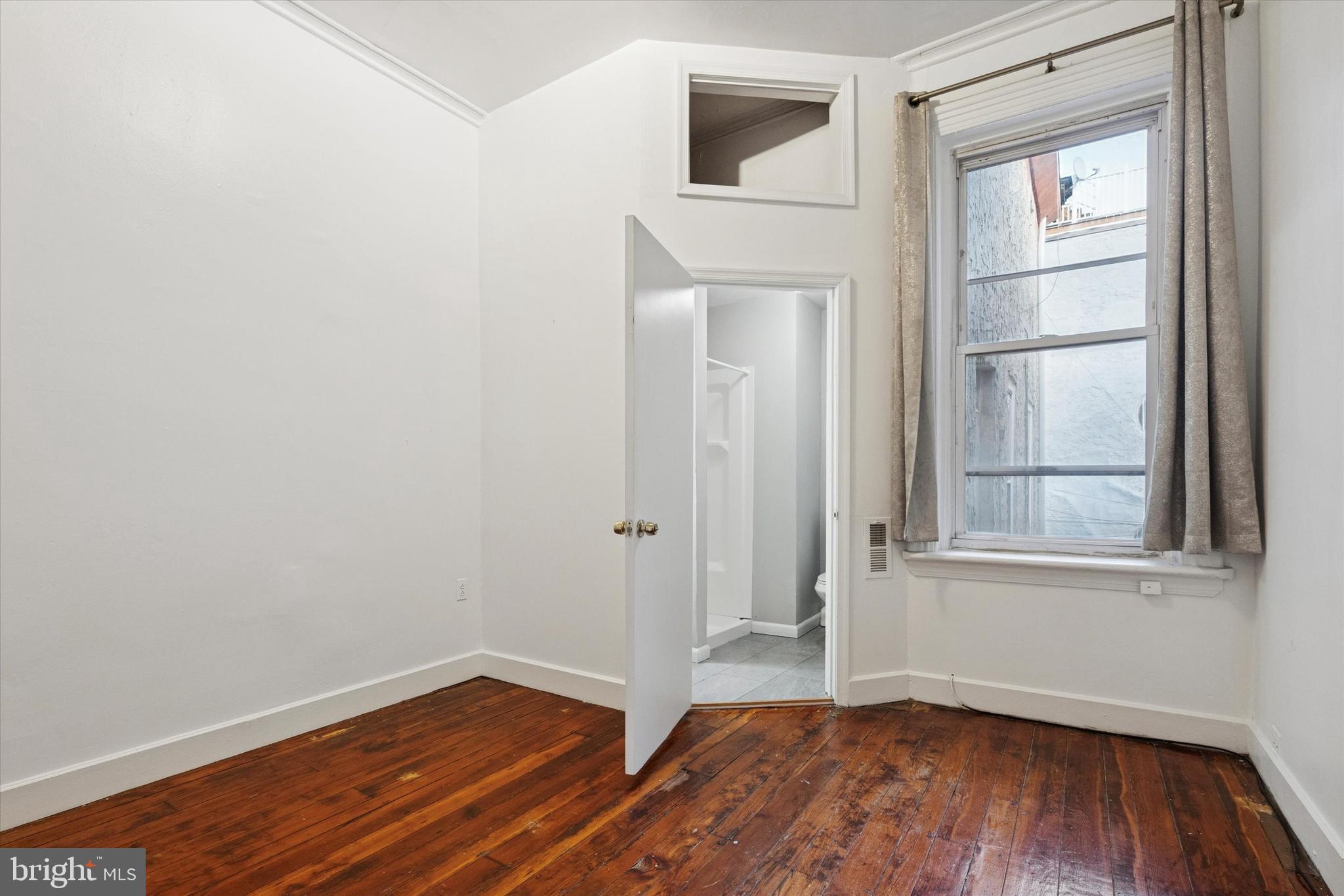 159 North 21st Street, Unit 2F Philadelphia, PA 19103 - Photo 15 of 18 Bedroom with Bathroom View