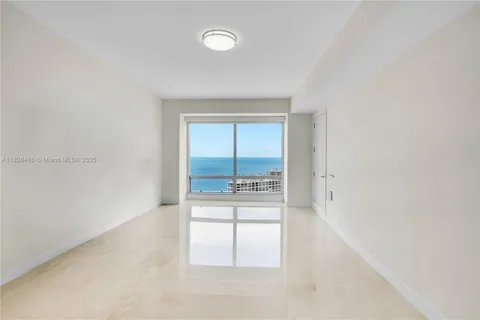 a view of a kitchen with a sink