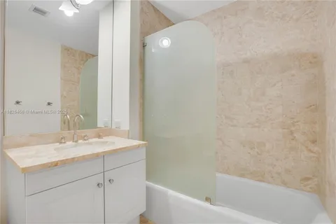 a bathroom with a sink and a bathtub