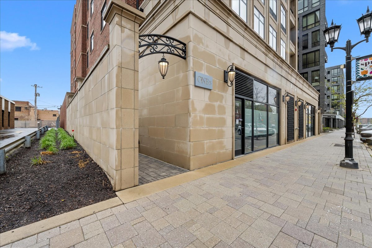 195 North Addison Avenue, Unit PH03 Elmhurst, IL 60126 - Photo 1 of 36 a view of a house with brick walls
