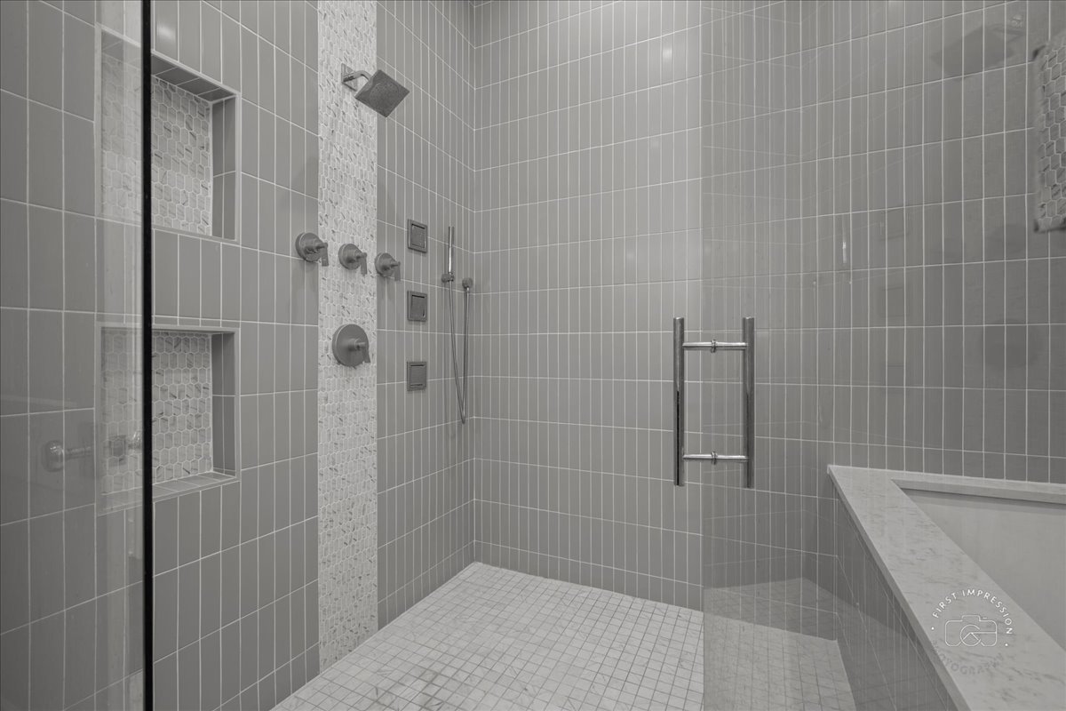 195 North Addison Avenue, Unit PH03 Elmhurst, IL 60126 - Photo 23 of 36 a bathroom with a shower
